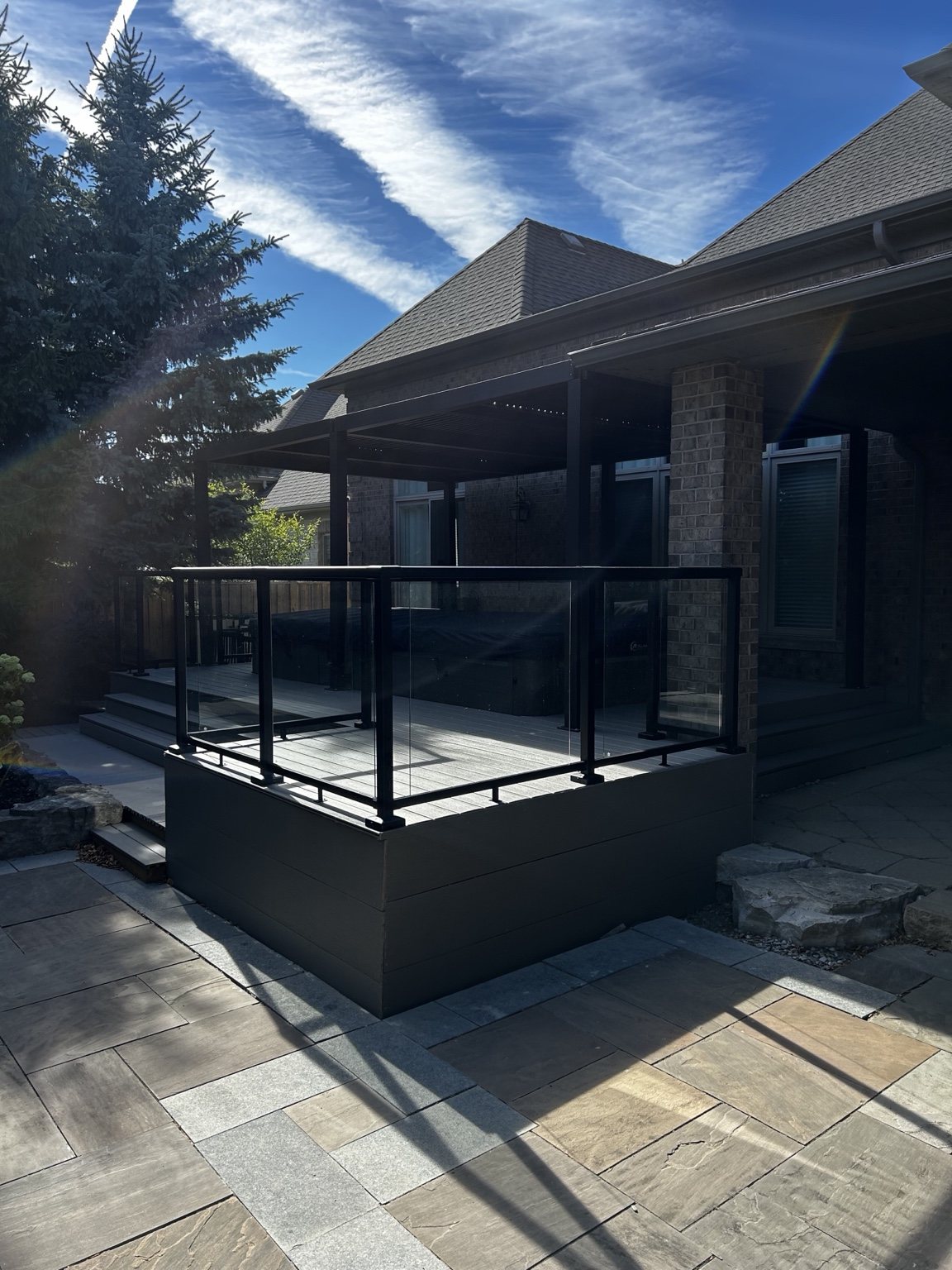 Luxury outdoor living space by True Craft Builders